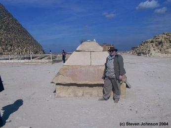 Eddie standing by the Pyramidion